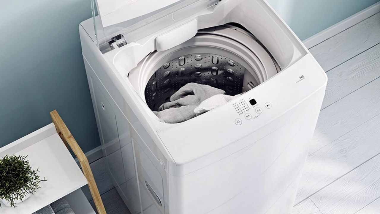 Вертикальна пральна машина